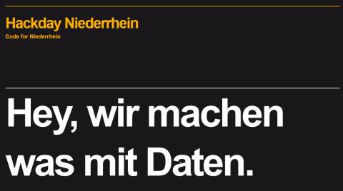 Gelbe Schrift auf schwarzem Hintergrund: Hackday - Code for Niederrhein